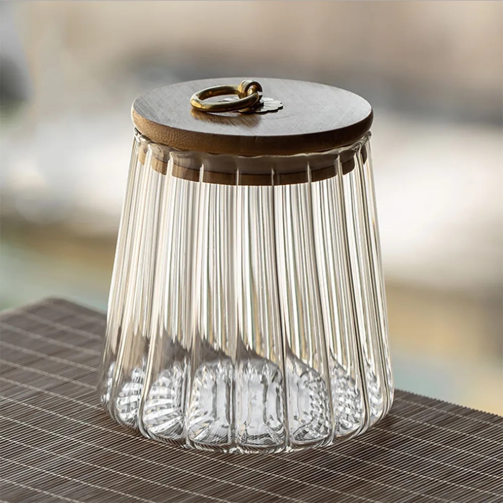 21 oz Transparent Glass Seal Jar with Petal Design With Lid